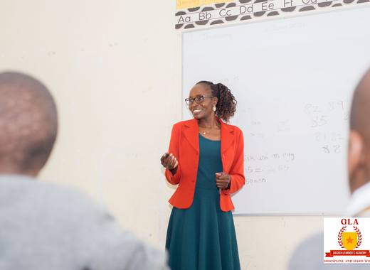 Teacher working closely with a Golden Learners pupil